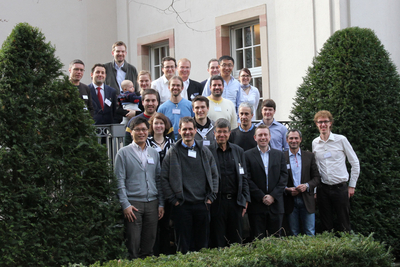 Group photo of all participants of the mid-term meeting